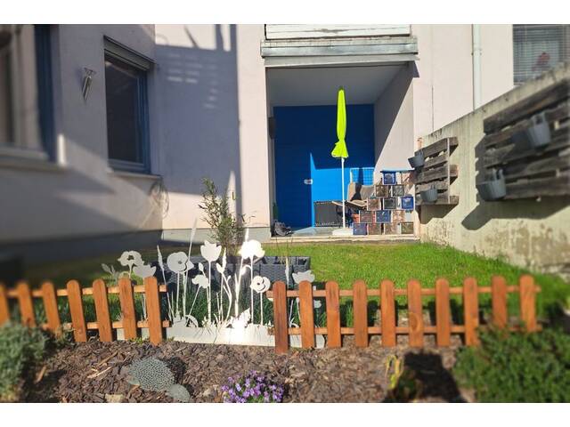 Immobilie in Mürzzuschlag - 4 Zimmer Wohnung 97 m² mit kleinem Garten und Sichtglas Kaminofen - Bild 3