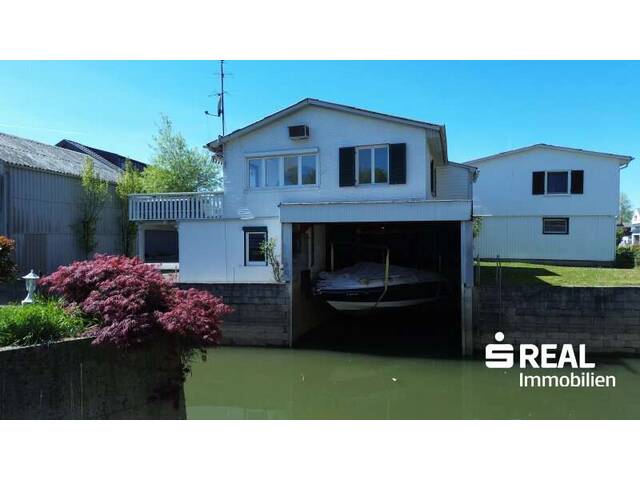 Immobilie in Hard - Ferienhaus mit Bootsgarage inklusive Motorboot - Bild 0