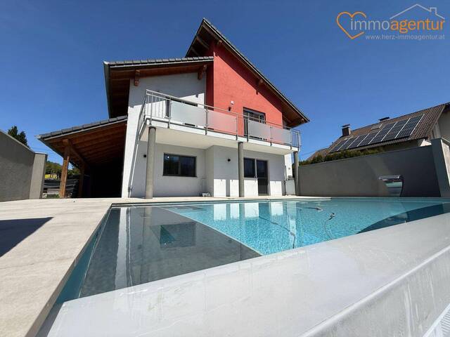 Immobilie in Offenhausen - HIGH-END RAUMWUNDER: mit ca. 222 m² - Gesamter Wohnnutzfläche in 4625 Offenhausen - Infinity-Pool, 10kWp PV & Glasfaser für maximale Energie-Sicherheit & Erreichbarkeit! - Bild 1