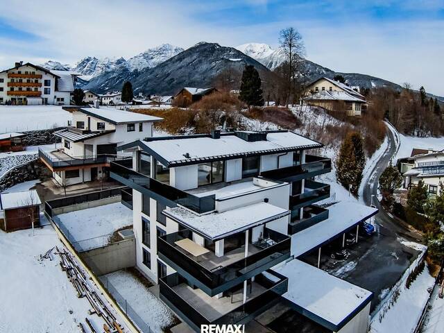 Immobilie in Schönberg im Stubaital - 15 Minuten von Innsbruck: Prächtige 3-Zimmer-Neubauwohnung mit 90 m² großem Garten und Terrasse - Bild 0