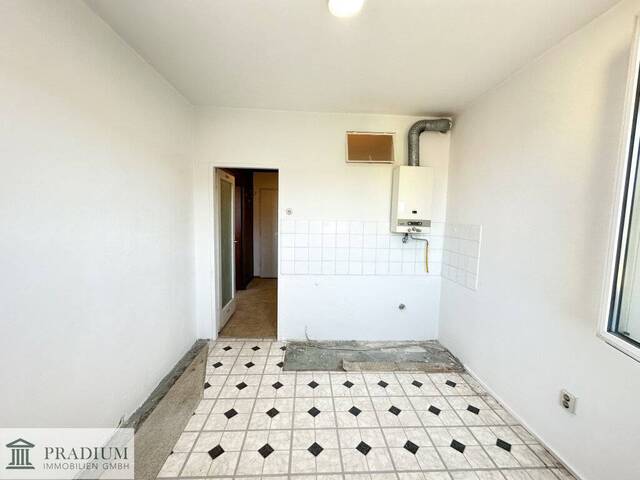 Immobilie in Gumpoldskirchen - Wohnen, wo der Wein wächst – 35 m² Wohnglück zum Revitalisieren nahe Baden & Mödling - Bild 2