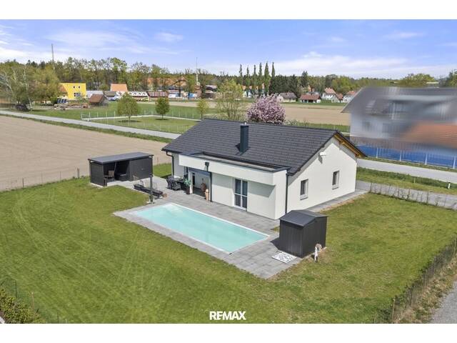 Immobilie in Gleinstätten - Moderner Town & Country Bungalow mit Pool, Carport und großzügigem Eigengrund in sonniger Lage - Bild 3