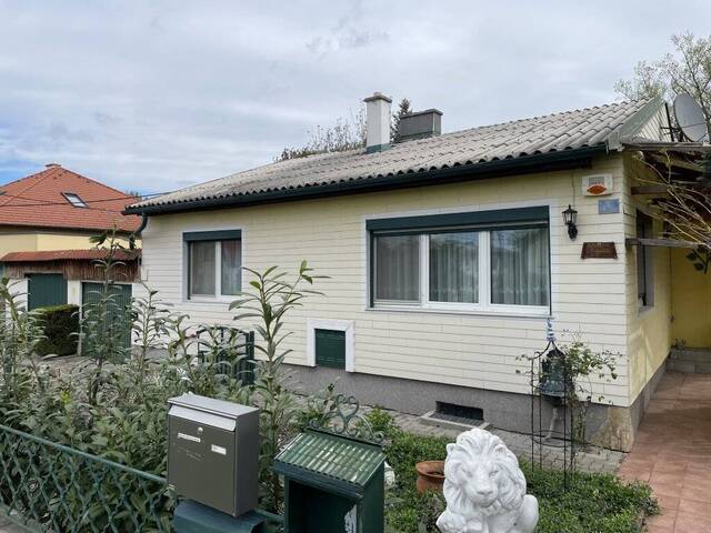Immobilie in Steinbrunn - GEPFLEGTES EINFAMILIEN-HAUS MIT BEZAUBERDEM GARTEN - 2 GARAGEN/WERKSTATT! - Bild 1