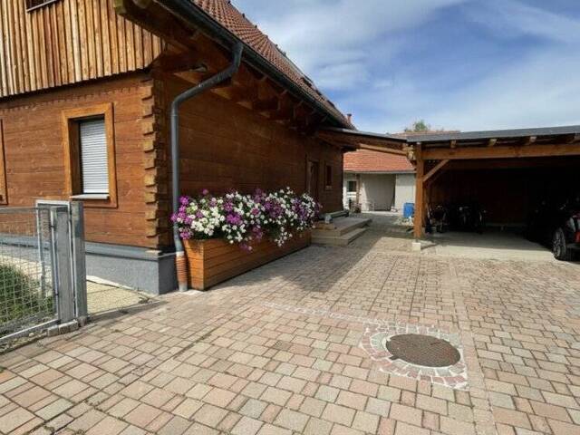 Immobilie in Obervogau - Obervogau - Charmantes Einfamilienhaus mit 4 Zimmern und einem 2ten kleinen Haus sowie Doppelcarport - vielseitig verwendbar! - Bild 1
