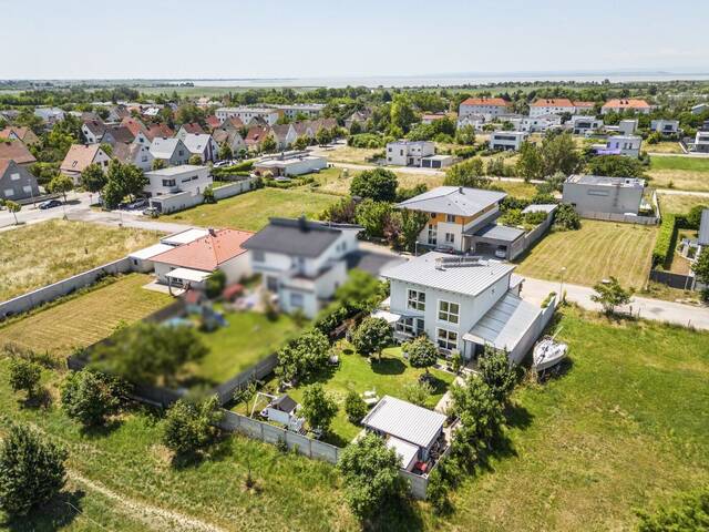 Immobilie in Neusiedl am See - EINFAMILIENHAUS MIT GARTENOASE UND EINLIEGERWOHNUNG ZUM WOHLFÜHLEN - Bild 0