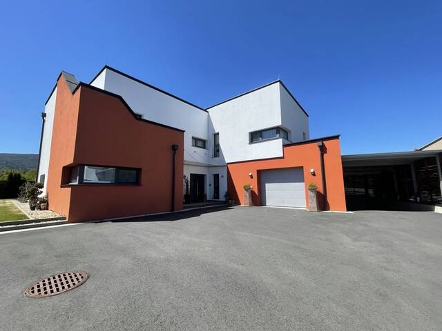 Immobilie in Pöllau - Pöllau - Designerhaus mit Panoramadachterrasse, zwei Wohneinheiten und Premium Garagenlösung Platz für 5 Autos - sehr interessant für Oldtimer oder Luxusautos - Bild 2