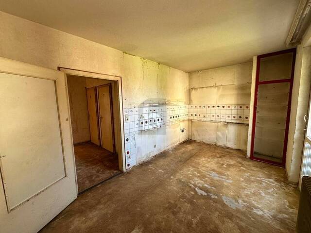 Immobilie in Wattens - RENOVIERUNGSBEDÜRFTIGE WOHNUNG MIT OST- UND WESTBALKON UND IDEALER RAUMAUFTEILUNG - Bild 3