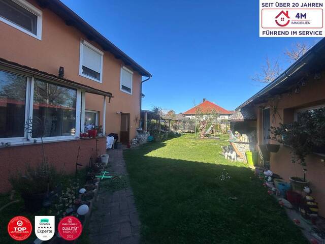 Immobilie in Strasshof an der Nordbahn - Stilvolles Zweifamilienhaus mit großem Privatgarten – Großzügiges Wohnen auf zwei Ebenen - Bild 1