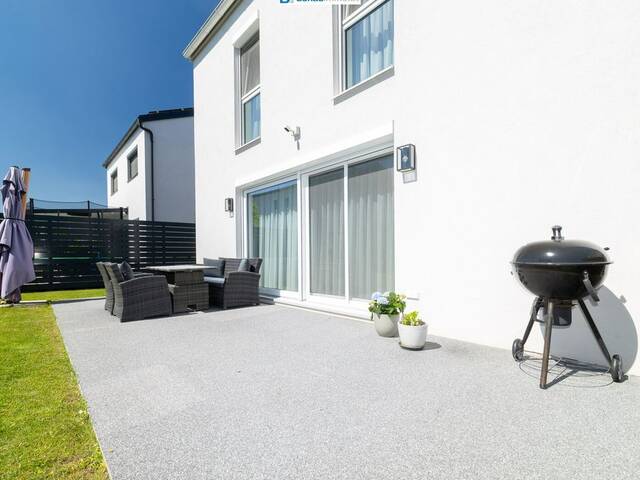 Immobilie in Bruck an der Leitha - Einziehen und wohlfühlen: Schlüsselfertiges Massivhaus mit Keller, Garten & Wärmepumpe - Bild 1