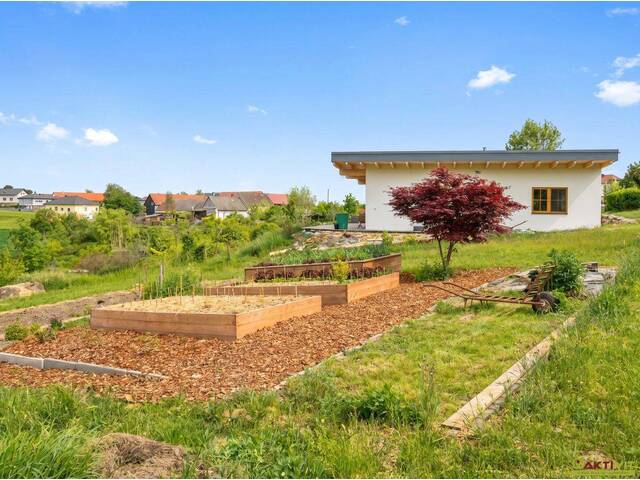 Immobilie in Großmürbisch - Moderner Holz-Bungalow in absoluter Ruhelage mit großem botanischem Garten - Bild 0
