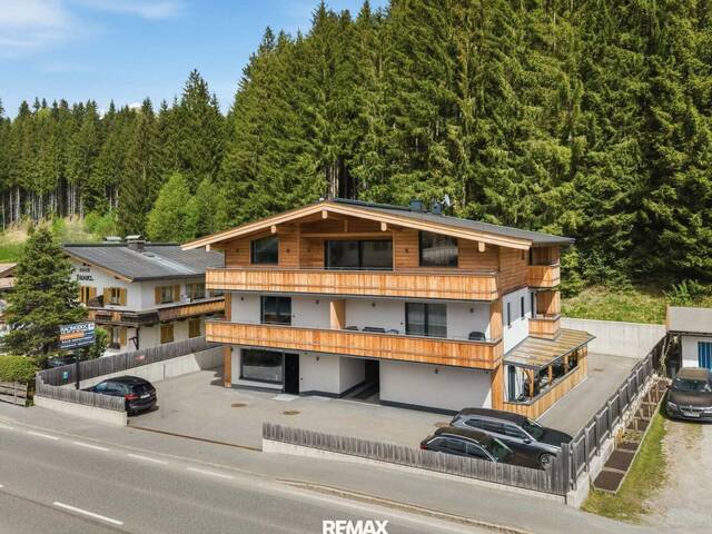 Immobilie in Aurach bei Kitzbühel - Living Elevated: Familien-Refugium mit Traum-Bergblick in Aurach bei Kitzbühel - Bild 0