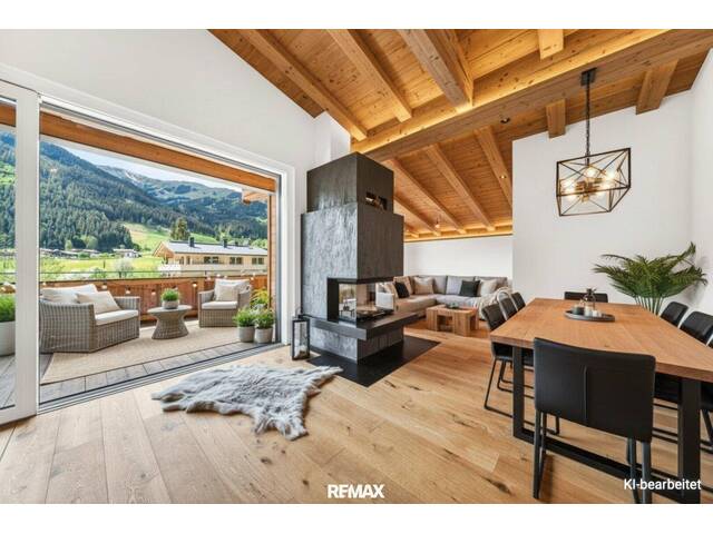 Immobilie in Aurach bei Kitzbühel - Mit dem Lift direkt in Ihr neues exklusives Penthouse mit Glaskamin und Traum Ausblick in Aurach bei Kitzbühel - - Bild 2
