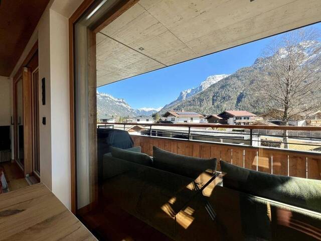 Immobilie in Waidring - Exklusive Designwohnung mit Kamin & Panorama-Balkon - Bild 1