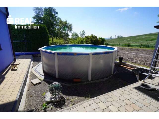 Immobilie in Niederleis - Ideal für Pferde und Naturliebhaber - einladendes Einfamilienhaus mit großer Terrasse und Garage - Bild 4