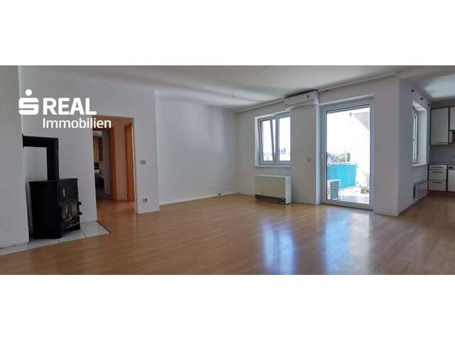 Immobilie in Neusiedl am See - Top Lage - 4-Zimmer-Wohnung mit Loggia, Klimaanlage und Schwedenofen - unmittelbar beim Schulzentrum, Bahnhof und Stadtzentrum! - Bild 2
