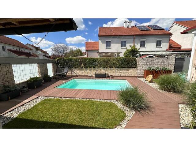 Immobilie in Bruckneudorf - Charmantes Reihenhaus mit Pool & Top-Ausstattung - Bild 1