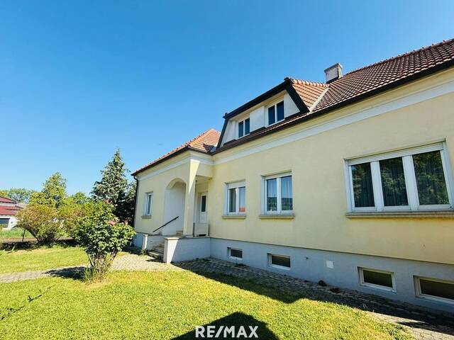 Immobilie in Zurndorf - 7.337 m2 Mehrfamilienhaus, zwei Wohneinheiten, Doppelgarage, großer Garten, mit angrenzender Landwirtschaftlicher Fläche - Bild 2