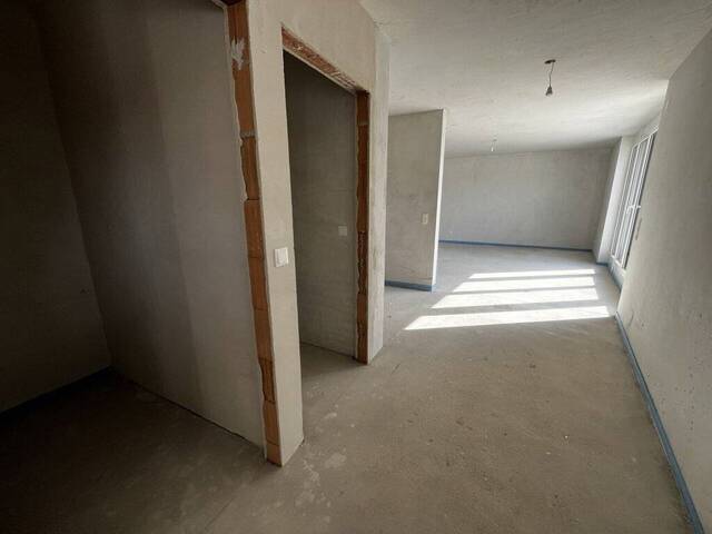 Immobilie in Obersdorf - Obersdorf Living - Erstbezug: 131m² Maisonette Loft - Wohnen mit beeindruckendem XL Wohnbereich - Bild 1