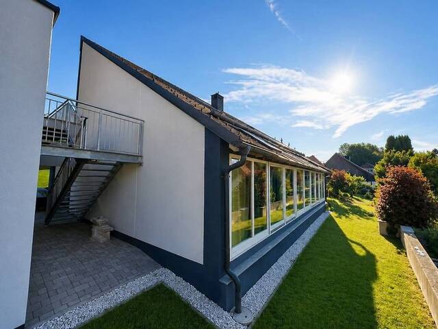 Immobilie in Spielberg - Außergewöhnliches Einfamilienhaus mit Wintergarten & Doppelgarage mit Hebebühne in Toplage von Spielberg - Bild 1
