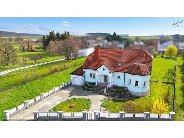 Immobilie in Neutal - Stilvolles Einfamilienhaus mit weitläufigem Grundstück in ruhiger Lage - Bild 1