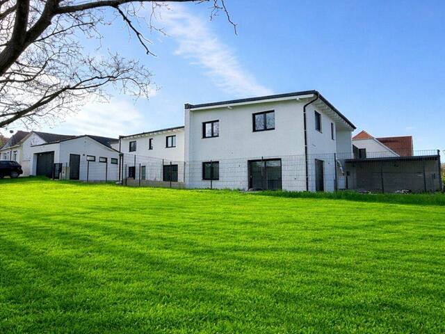 Immobilie in Sigleß - Wohnen mit Stil in Sigleß – Garage, Garten und Dachterrasse inklusive - Bild 1
