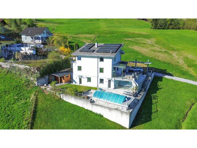 Immobilie in Pollingberg - DESIGN TRIFFT NATUR – EXKLUSIVES EINFAMILIENHAUS MIT POOL UND WEITBLICK - Bild 0