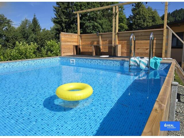 Immobilie in St. Urban - Barrierefreier Bungalow mit XL-Garten und Pool in Ruhelage - Bild 2