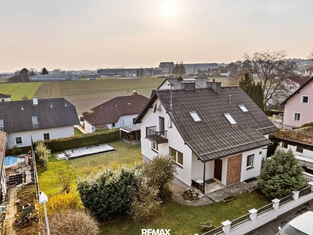 Immobilie in Leonding - Sonnige Wohnidylle in Leonding mit Garten & Pool - Bild 0