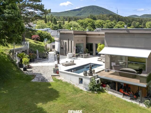 Immobilie in Hernstein - Exklusiver Design-Bungalow mit Pool, Sauna & modernster Haustechnik in absoluter Ruhelage - Bild 0