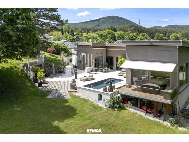 Immobilie in Hernstein - Exklusiver Design-Bungalow mit Pool, Sauna & modernster Haustechnik in absoluter Ruhelage - Bild 3