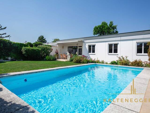Immobilie in Maria Enzersdorf - Großzügiger Bungalow mit Pool, hochwertig ausgebautem Untergeschoß und bemerkenswerter Energieeffizienz in der Südstadt - Bild 2