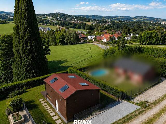 Immobilie in Leonding - Exklusives Holzhaus mit Wellnessfaktor und Pöstlingbergblick - Bild 0