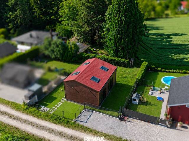 Immobilie in Leonding - Exklusives Holzhaus mit Wellnessfaktor und Pöstlingbergblick - Bild 1