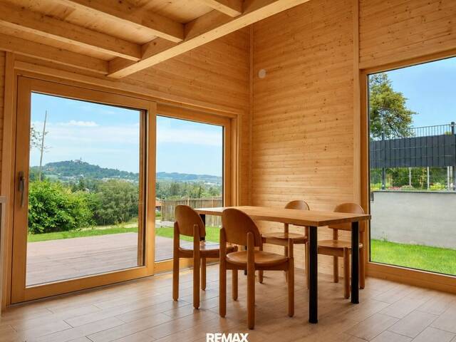 Immobilie in Leonding - Exklusives Holzhaus mit Wellnessfaktor und Pöstlingbergblick - Bild 2