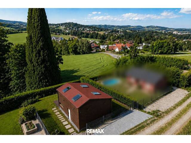 Immobilie in Leonding - Exklusives Holzhaus mit Wellnessfaktor und Pöstlingbergblick - Bild 3