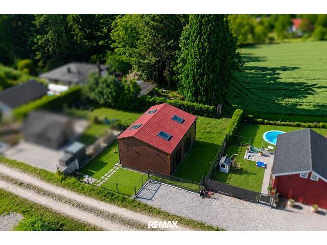 Immobilie in Leonding - Exklusives Holzhaus mit Wellnessfaktor und Pöstlingbergblick - Bild 4