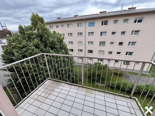 Immobilie in Linz - Charmante 3-Zimmer-Eigentumswohnung mit Kachelofen und Entwicklungspotenzial in zentraler Lage von Linz - Bild 1