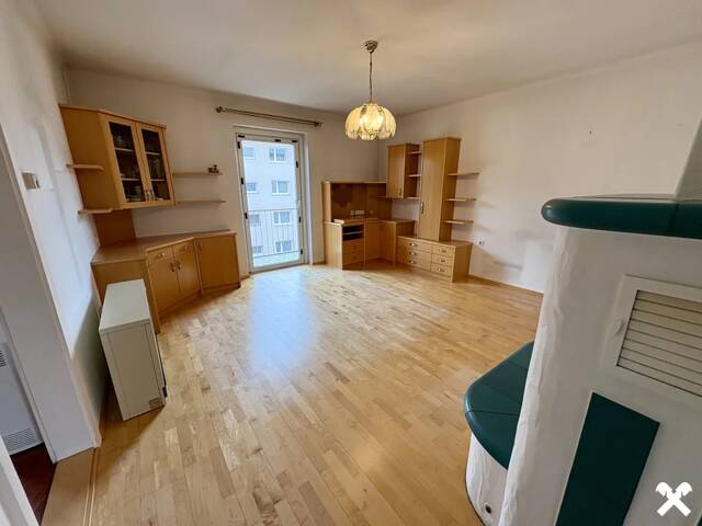 Immobilie in Linz - Charmante 3-Zimmer-Eigentumswohnung mit Kachelofen und Entwicklungspotenzial in zentraler Lage von Linz - Bild 2