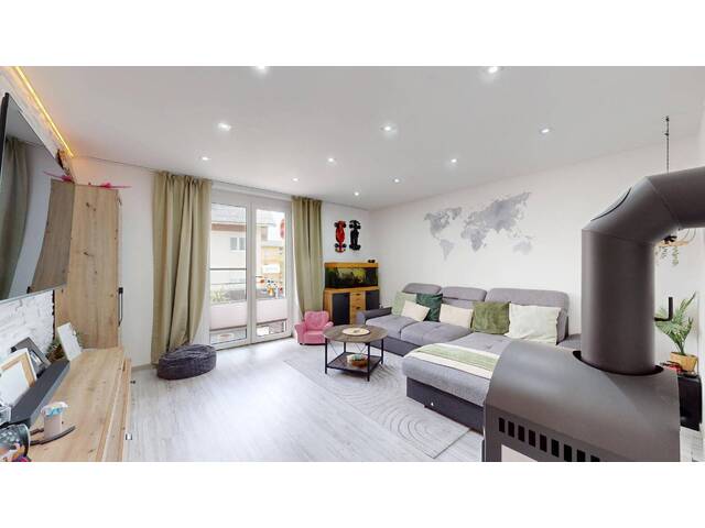 Immobilie in Saalfelden am Steinernen Meer - Wohnglück mit Ofenwärme & Sonnenbalkon - Modernisierte 3-Zimmer-Balkonwohnung in Saalfelden - Bild 1