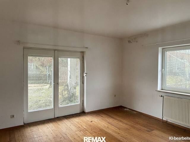 Immobilie in Braunau am Inn - Sanierungsbedürftiges Wohnhaus in begehrter Stadtrandlage von Braunau am Inn - Bild 2