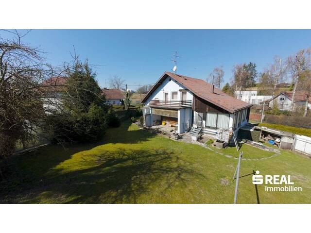 Immobilie in Mehrnbach - Wohnhaus mit viel Potenzial und großem Baugrundstück in Stadtnähe von Ried im Innkreis - Bild 1