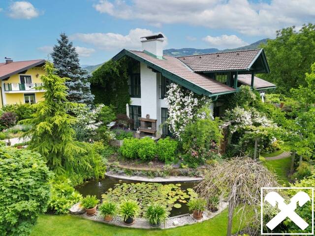 Immobilie in Bleiburg - Wohlfühlen garantiert! Attraktives Wohnhaus mit Garage, Pool und wunderschöner Gartenanlage - Bild 1