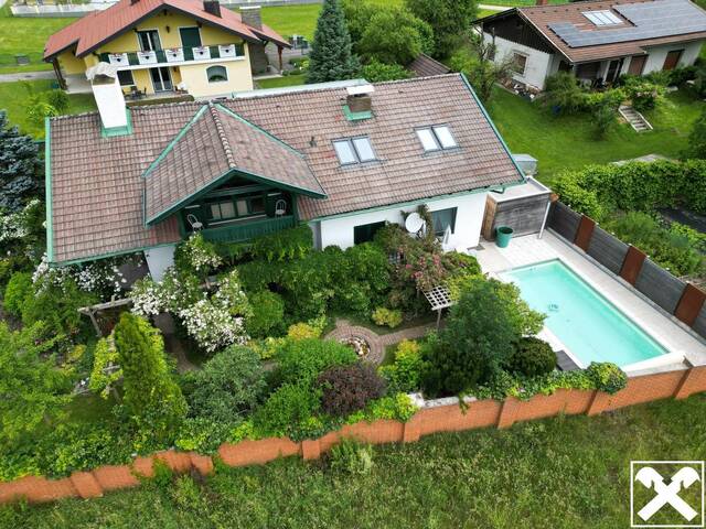 Immobilie in Bleiburg - Wohlfühlen garantiert! Attraktives Wohnhaus mit Garage, Pool und wunderschöner Gartenanlage - Bild 2