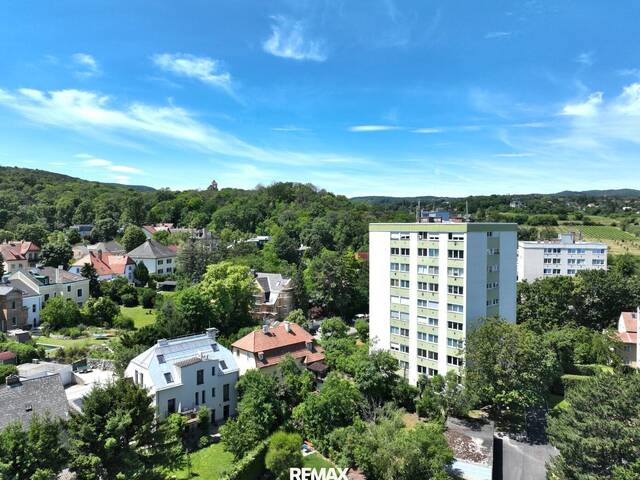 Immobilie in Maria Enzersdorf - Wohnen mit Weitblick - helle Wohnung im 7. Liftstock mit spektakulärer Fernsicht! - Bild 0