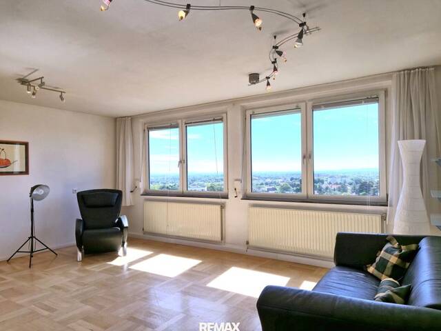 Immobilie in Maria Enzersdorf - Wohnen mit Weitblick - helle Wohnung im 7. Liftstock mit spektakulärer Fernsicht! - Bild 2