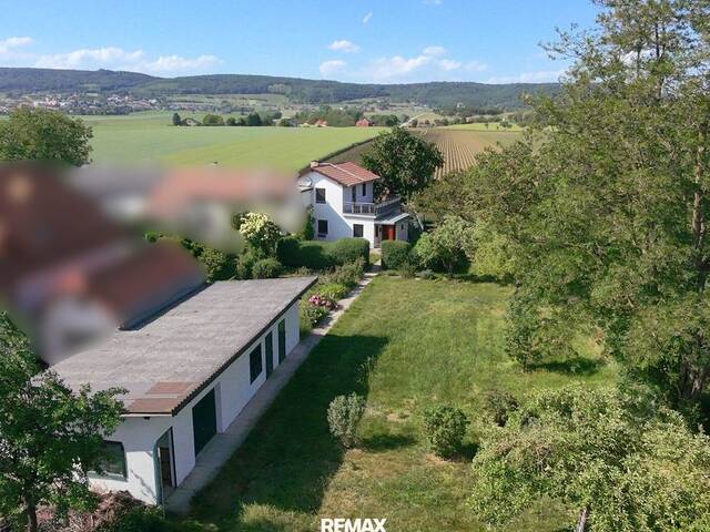Immobilie in Oberwölbling - Investition mit Potenzial: Große Baugrundstücke inkl. Eigentumswohnung in 3124 Oberwölbling - Bild 1