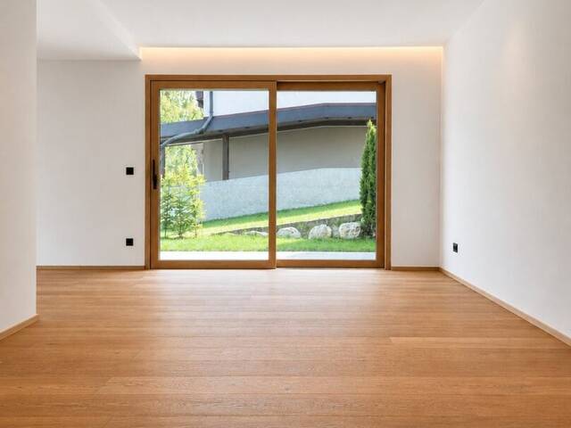 Immobilie in St. Ulrich am Pillersee - Hochwertige Erstbezugs-Maisonette mit Eigengarten - Bild 1