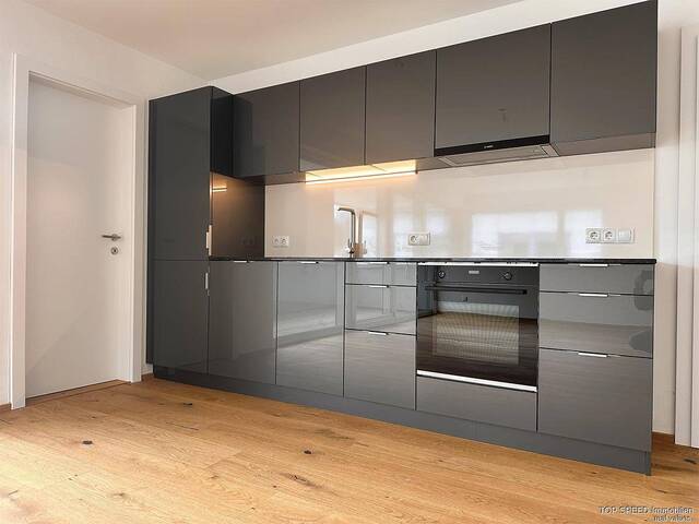 Immobilie in Altenmarkt im Pongau - Moderne Eigentumswohnung mit Südbalkon, 2 Schlafzimmern und 2 PKW-Stellplätzen in zentraler Lage - Bild 1