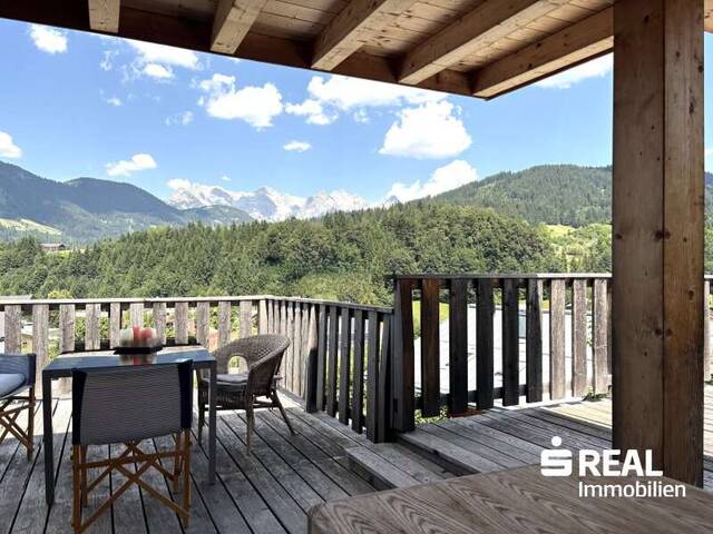 Immobilie in Fieberbrunn - Ein Wohntraum in erhöhter Lage mit unvergleichlichem Bergpanorama: 12 Zimmer, Garten, 5 Terrassen, Garage, 6 Stellplätze! - Bild 1