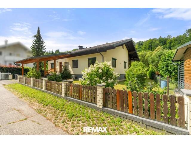 Immobilie in Lavamünd - Gartenparadies in einzigartiger Naturlage: Gemütlicher Bungalow mit Wintergarten direkt an der Drau in Lavamünd - Bild 1